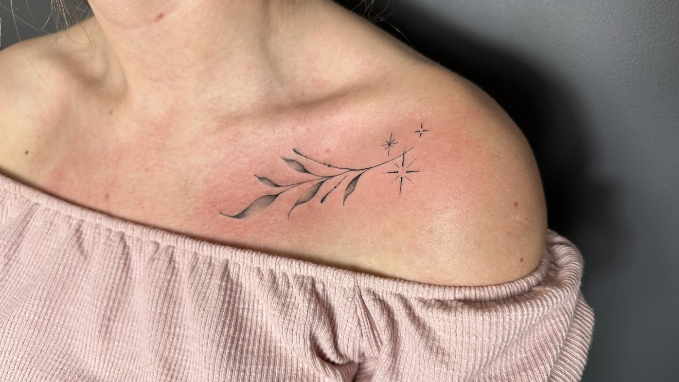 delicate artistic tattoo on the arm